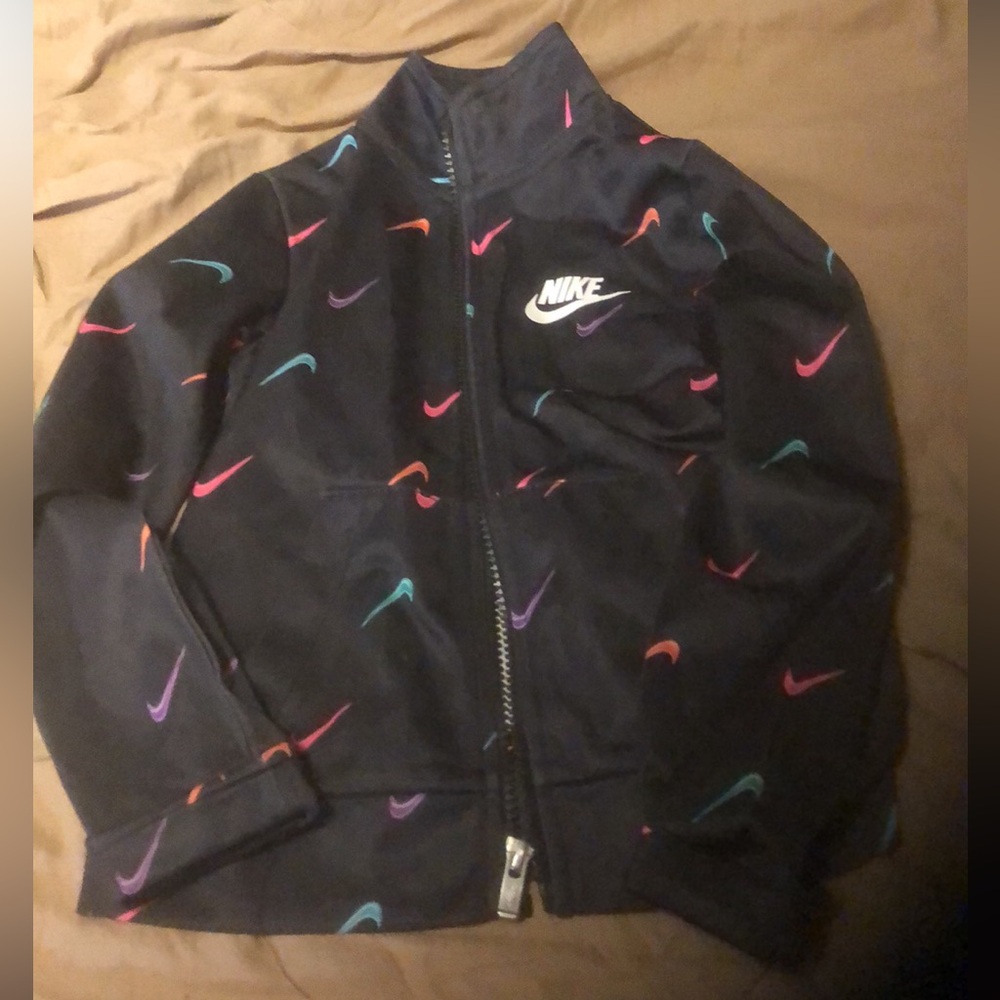 Toddler. Nike jacket new, but used in Good condition